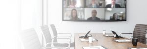 Modern Multiethnic business team having discussion and online meeting in video call